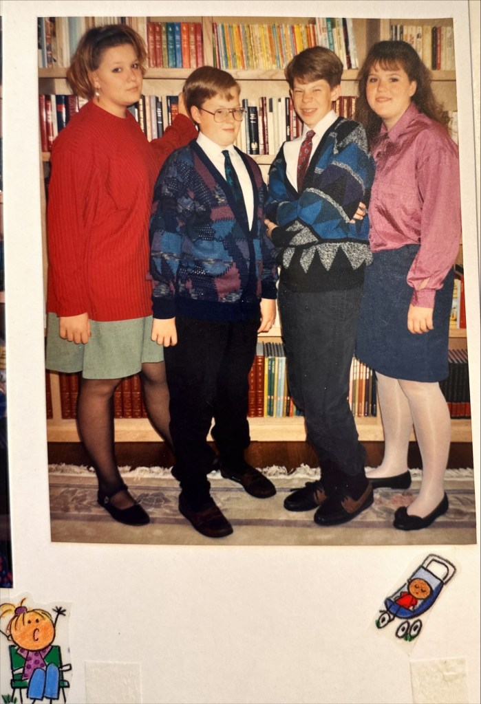 a photo of the Joseph and his siblings in front of bookcases.  Awkward and abused does not begin to describe our house and the people in it... except for Mother.  She was perfect.