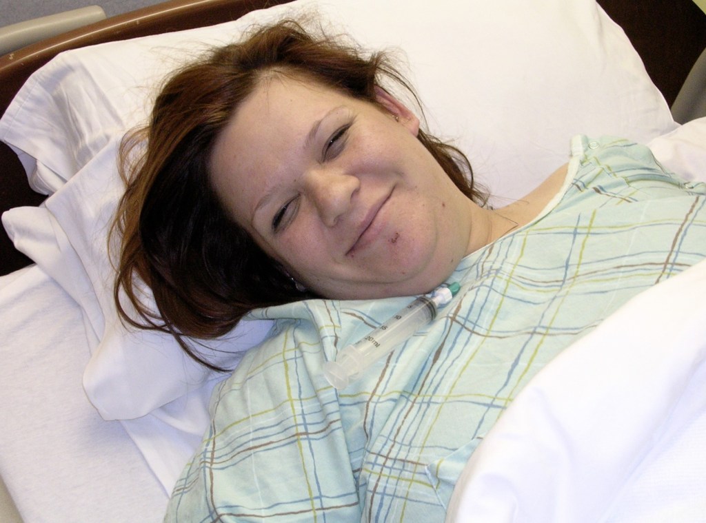 a photo of Courtney post-birth.  she looks so happy and fulfilled and maybe a bit medicated