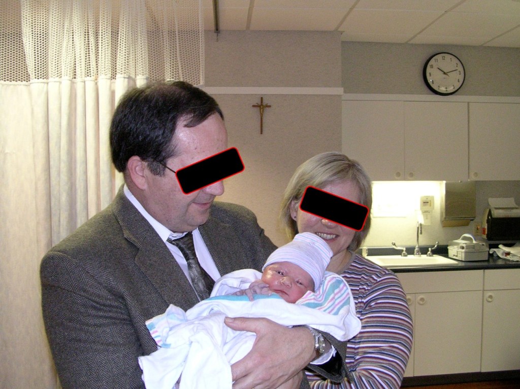 picture of Mother and Father at the hospital with Courtney's child.