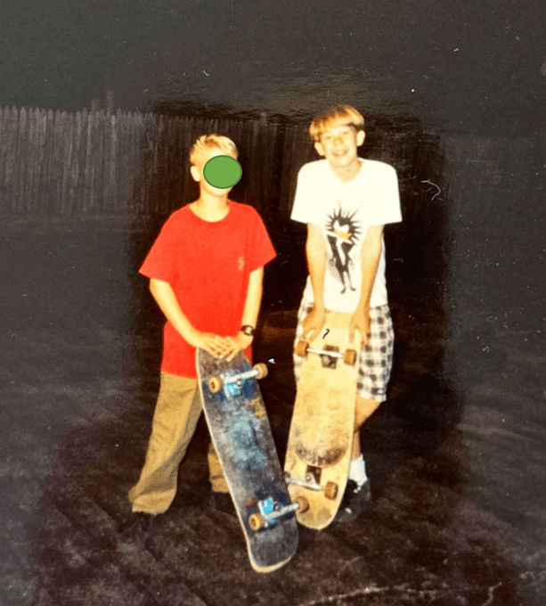 Author Joseph* on right, friend B* on left.  We were skateboarding in a local parking lot.  The shorts and skateboard were given to me by skateboarder R* who was hanging with Courtney* at this time. 