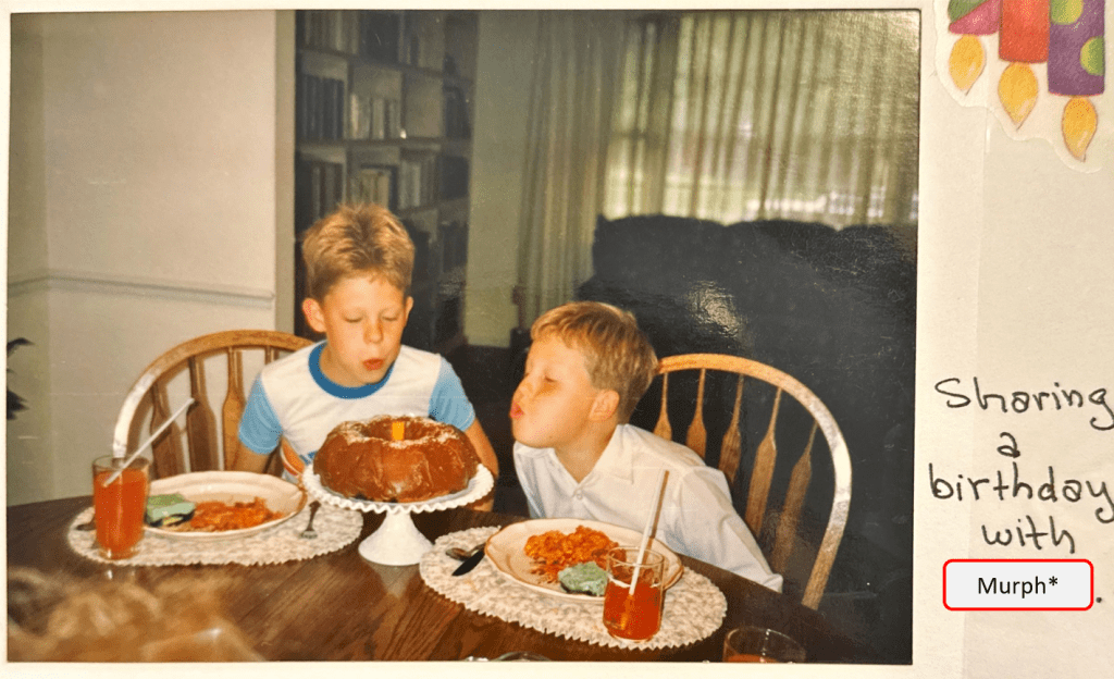 author Joseph shares a birthday with Murph.  there is orange soda, jello salad, a bundt cake and some type of lasagna.